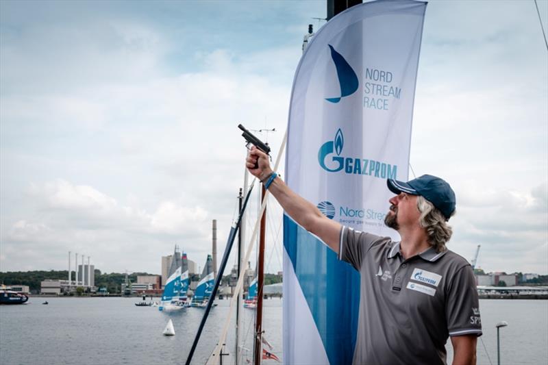 Alexey Zaytsev gives the starting signal - 2021 Nord Stream Race, day 1 photo copyright Nord Stream Race / Marina Semenova taken at Kieler Yacht Club