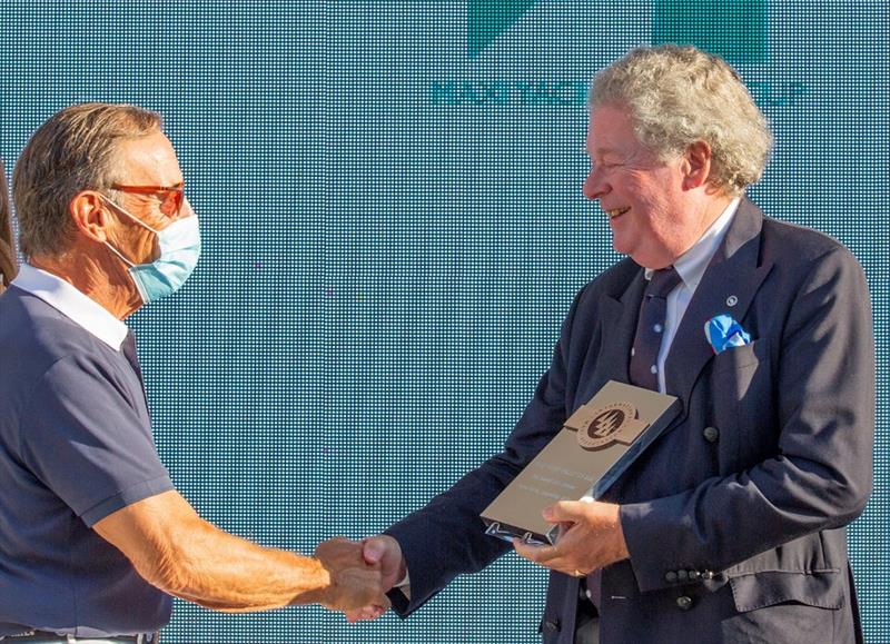 IMA's Secretary General Andrew McIrvine presents Sir Lindsay Owen Jones with the Trophy for finishing 'Highest Placed IMA member' at the Maxi Yacht Rolex Cup photo copyright IMA / Studio Borlenghi taken at Yacht Club Costa Smeralda