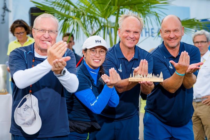 They want to keep on sailing, according to their proud sign, the deaf crew Jürgen Keuchel, Karen Maren Suthmann, helmsman Markus Halle and Jan Lichtenberger (from left) photo copyright Sascha Klahn taken at Kieler Yacht Club