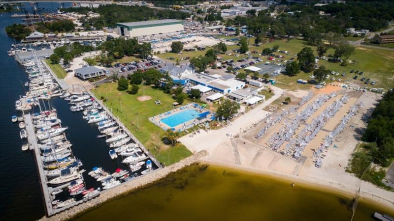 Pensacola Yacht Club sits on 22 acres where Bayou Chico flows into Pensacola Bay. Small boats ike these 301 Optis, launch from the 250 foot beach. Plenty of trailer space is available for boat storage between regattas. - photo © Barnes & Co / Pensacola YC