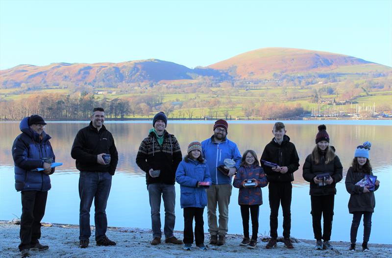 All the prizewinners after the presentation by UYC President John Robinson photo copyright UYC taken at Ullswater Yacht Club