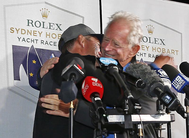 Skipper Mark Bradford (L) and Owner Peter Harburg (R) celebrate Black Jack's Line Honours win in the 2021 Sydney hobart photo copyright Bow Caddy Media taken at Cruising Yacht Club of Australia