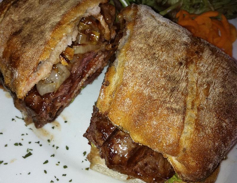 The Gucci-est of all steak sandwiches. Yum. Worth any sail in any conditions to get there for. Really! photo copyright John Curnow taken at King Island Boat Club