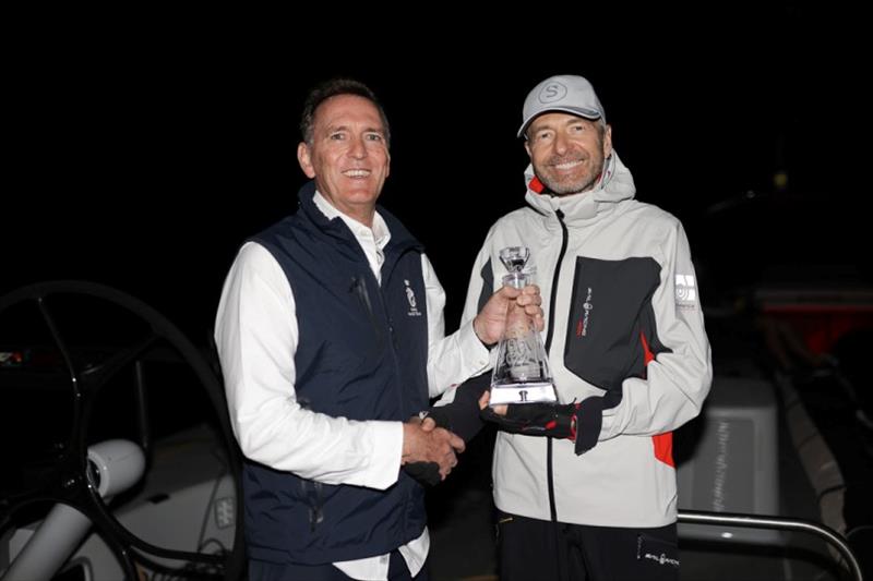 RORC CEO Jeremy Wilton presents Dmitry Rybolovlev, owner of Skorpios with the Monohull Line Honours Trophy - photo © Arthur Daniel / RORC
