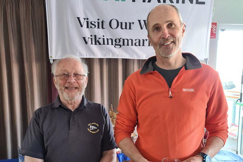 Sean Craig (ILCA 6) [Winner Series 2] with Frank Guilfoyle - Viking Marine Frostbite Series prize-giving at Dun Laoghaire photo copyright Frank Miller taken at Dun Laoghaire Motor Yacht Club