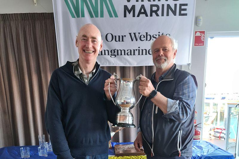 Frank Miller collects the Overall Series Trophy for Fireballs from sponsor Ian O’Meara - Viking Marine Frostbite Series prize-giving at Dun Laoghaire photo copyright Frank Miller taken at Dun Laoghaire Motor Yacht Club