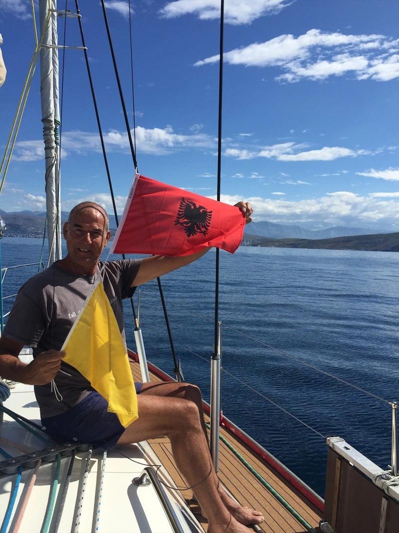 Raising the Albanian and Q Flag as we enter Albanian Waters - photo © SV Red Roo