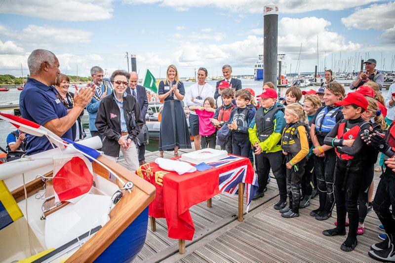 A smiling Princess Anne cuts a centenary cake on the pontoon - Youth Regatta Week at Royal Lymington - photo © Alex & David Irwin / www.sportography.tv