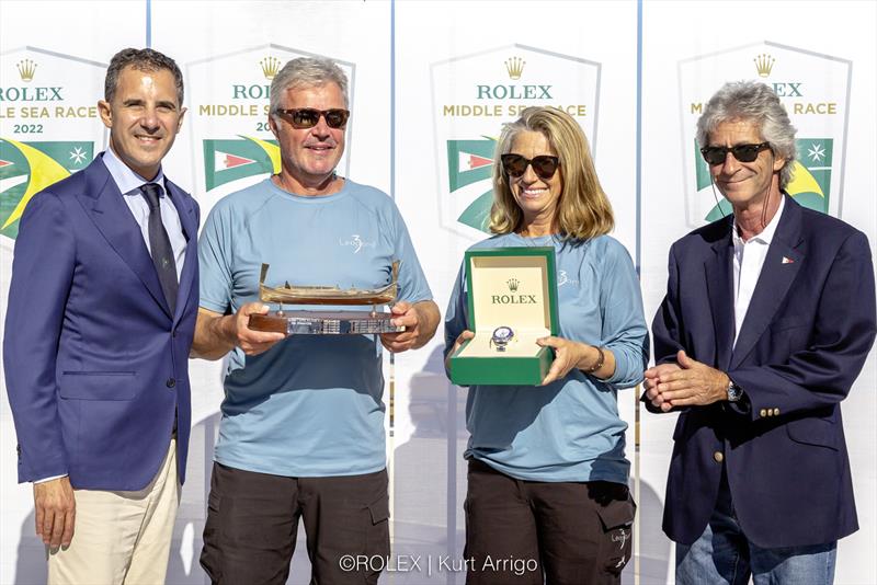 Malcolm R. Lowell of Edwards, Lowell with the Rolex Middle Sea Race monohull line honours winner, Joost Schultz and Laura de Vere of Leopard 3, and David Cremona, Commodore of the Royal Malta Yacht Club photo copyright Kurt Arrigo / Rolex taken at Royal Malta Yacht Club