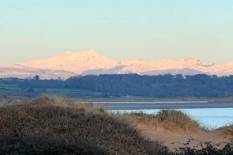 A snow-covered Snowdon and a beautiful backdrop for sailing at Pwllheli SC - photo © Peter Dunlop