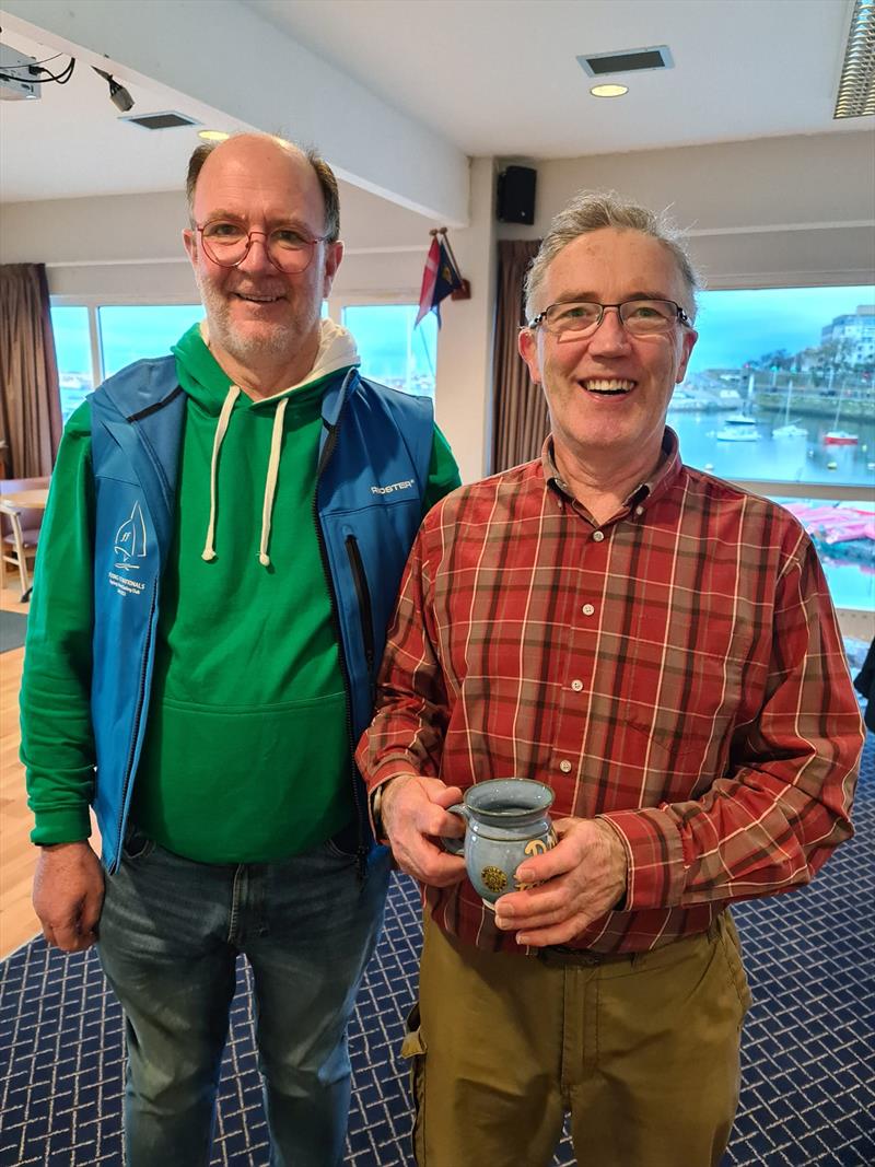 Karl Leavy (Aero) collects his Frostbite Mug from Cormac Bradley for Sunday 12th February - Viking Marine DMYC Frostbite Series 2 day 7 photo copyright Frank Miller taken at Dun Laoghaire Motor Yacht Club