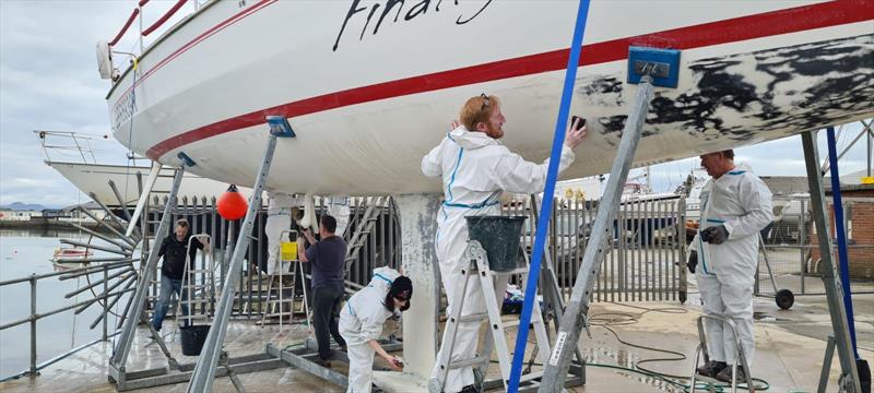 The crew of Finally getting ready for the year ahead photo copyright Paul Kitteringham taken at Pwllheli Sailing Club