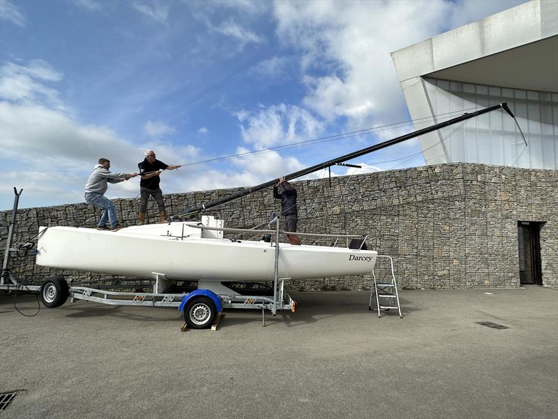 Commodore Mark Thompson stepping the mast of his J70 Darcey ready for racing photo copyright Vicky Cox taken at Pwllheli Sailing Club