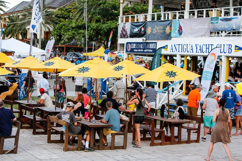 Crews winding down after racing with an English Harbour Rum at Antigua Yacht Club on English Harbour Rum Race Day at Antigua Sailing Week 2023 photo copyright Visual Echo taken at Antigua Yacht Club