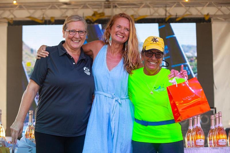 Alison Sly Adams, President and Commercial Director, Antigua Sailing Week, Camilla Holme, Locman Italy Area Manager, Caribbean Ltd, Pippa Turton skipper of Mozart photo copyright Visual Echo taken at Antigua Yacht Club