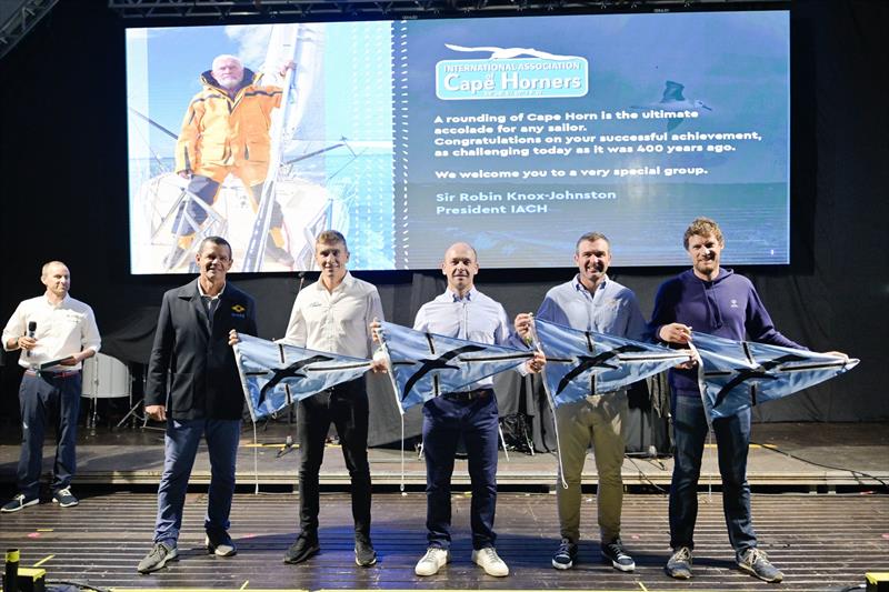 Torben Grael presenting the Ocean Race skippers with their IACH burgees at the Itajai prizegiving after rounding Cape Horn - photo © Sailing Energy / The Ocean Race