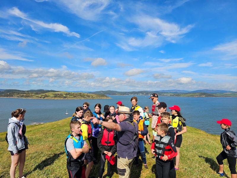 Solway Yacht Club Cadets Adventure Day - Identify the Galloway Hills: Willie Patterson points out the highlights of the fantastic view from the top of Hestan Island photo copyright Finlay Train taken at Solway Yacht Club