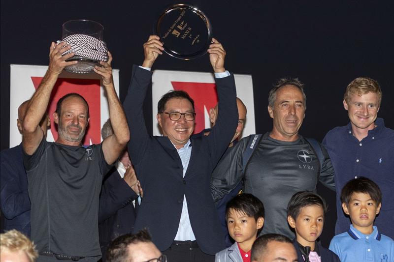 Terry Hui celebrates his victory with his Lyra afterguard including Philippe Mourniac and Nicolai Sehested - 2023 Les Voiles de Saint-Tropez, final day photo copyright Gilles Martin-Raget taken at Société Nautique de Saint-Tropez