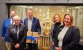 Alderman JP Smith receives his honorary Royal Cape Yacht Club in front of the Lipton Challenge Cup trophy cabinet. (Seen from left to right): William Crockett, Dave Hudson, Alderman JP Smith, Toni Mainprize and Kerry Pryde