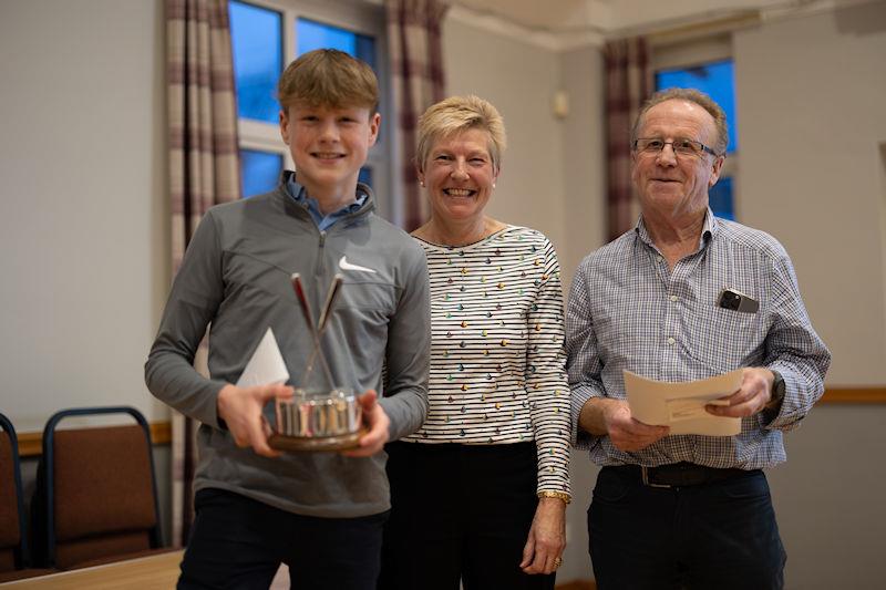 Solway Yacht Club annual Prize Giving: Finn Harris presented with the Cadet's Boat Handling Trophy by Liz Train, with announcer, Scott Train 2023 Club Commodore photo copyright Nicola McColm taken at Solway Yacht Club