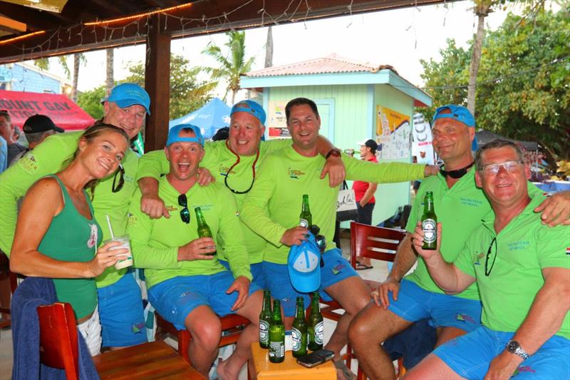 Enjoying an ice-cold Heineken after racing photo copyright Ingrid Abery / www.ingridabery.com taken at Royal BVI Yacht Club