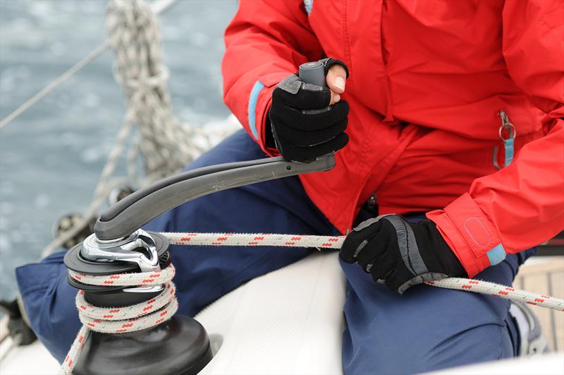 Close-up of female sailor trimming front sail at regatta - photo © MIT.EQ