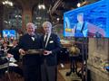 Carter “Bink” Bacon, right, receives the 2024 Rod Stephens Seamanship Trophy from CCA Commodore Jay Gowell in the Model Room of the New York Yacht Club © Barbara Watson