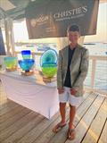 Ida Lewis Distance Race 2025 youth sailor with perpetual trophies © Donna Kelly