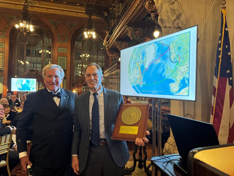 Finley H. Perry Jr., right, receives the Far Horizons Award for 2024 from CCA Commodore Jay Gowell - photo © Barbara Watson