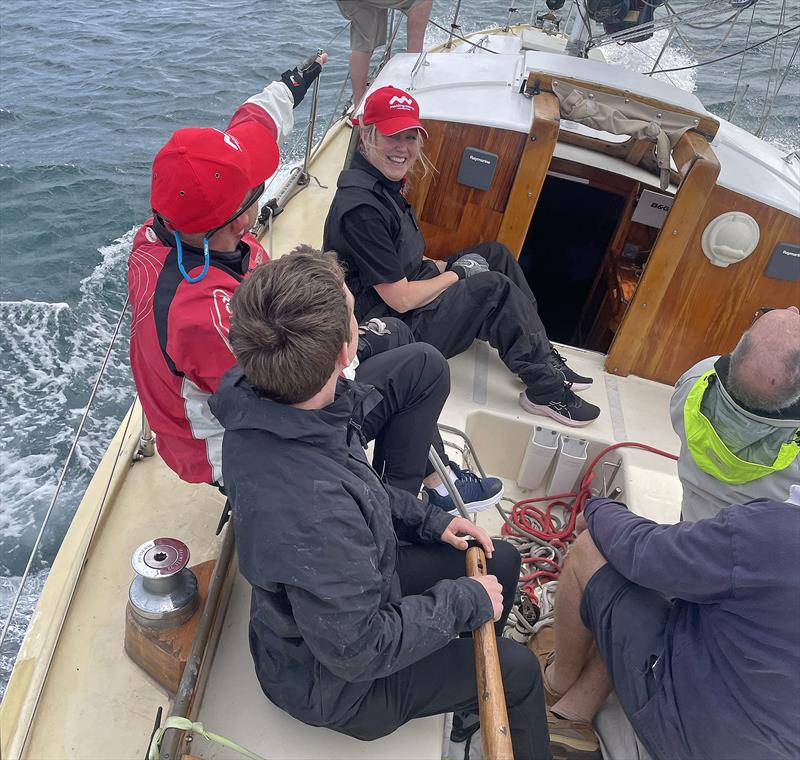 Paddy with the tiller on the famous Halverson, Solveig, during a race on Sydney Harbour - photo © Paddy McAlpine