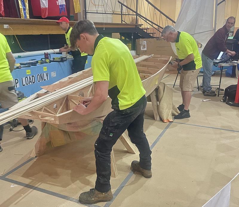 Paddy demonstrating his new skills as they build another Rainbow - photo © Paddy McAlpine