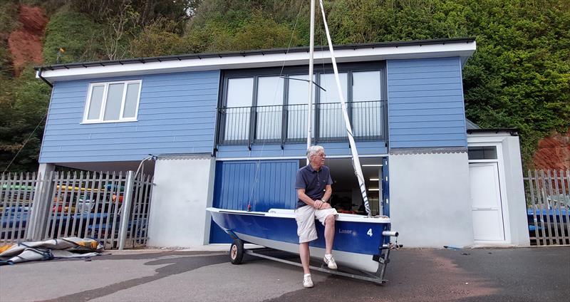 Babbacombe Corinthian Sailing Club Commodore Adrian Mark in front of the new clubhouse on Oddicombe Beach photo copyright Keith Rossiter taken at Babbacombe Corinthian Sailing Club