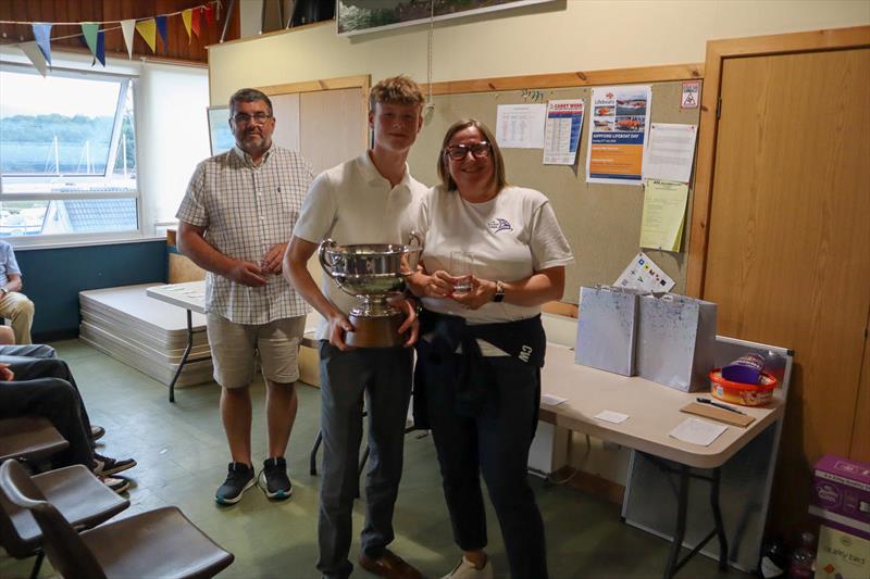 Solway Yacht Club Cadet Week - Finn Harris presented with his overall HCP1 trophy by Cadet Officer, Joanne Harris assisted by Commodore Scott McColm photo copyright Nicola McColm taken at Solway Yacht Club
