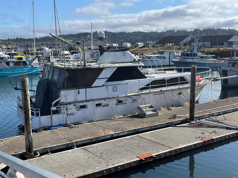 An abandoned derelict vessel at imminent risk of sinking at the Port of Newport, Oregon, will be removed under a groundbreaking removal program photo copyright Dorothy Diehl, Oregon Dept. of State Lands taken at 