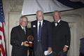 © Guy Gurney Special recognition award recipient Steve James (for a decade of service on the Awards Committee) is flanked by the incoming CCA Commodore Chace Anderson, left, and outgoing CCA Commodore Jay Gowell © Guy Gurney