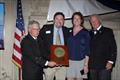 © Guy Gurney Christopher and Molly Barnes, center, receive the 2025 Far Horizons Award. With them are incoming CCA Commodore Chace Anderson, left, and outgoing CCA Commodore Jay Gowell © Guy Gurney
