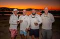Goggles and his winning Mister Magoo crew in front of a beautiful sunset at WSC &copy; Vampp Photography