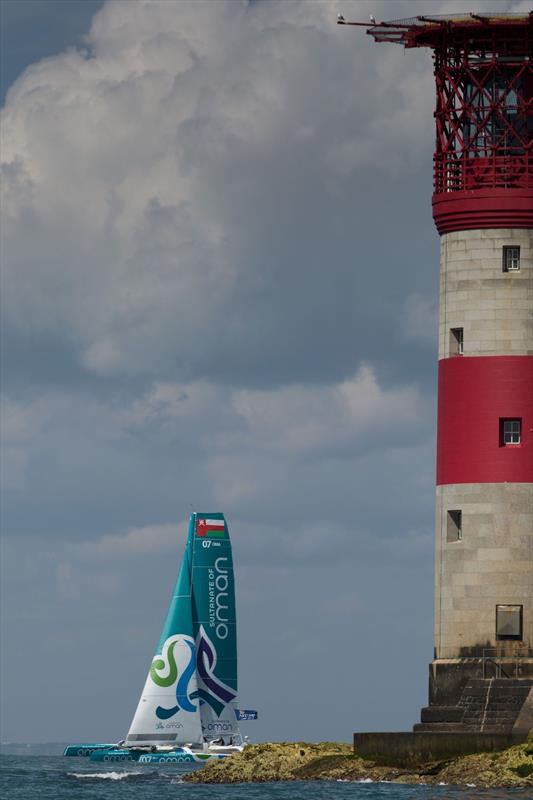 The Musandam-Oman Sail MOD 70 sails past The Needles lighthouse during the 2014 Artemis Challenge photo copyright Lloyd Images taken at Cowes Combined Clubs and featuring the MOD70 class