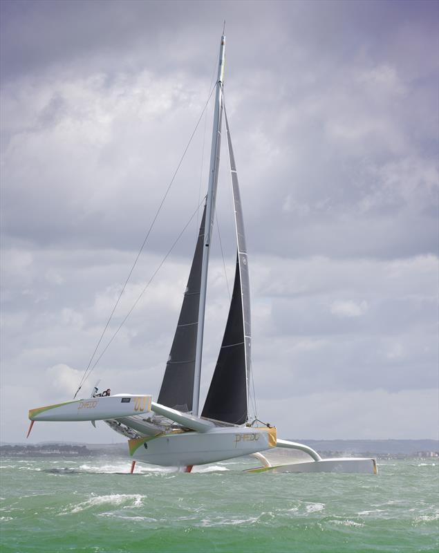 Phaedo 3 smashes the J.P.Morgan Asset Management Round the Island Race record in a time of 2 hours 23 minutes, 23 seconds photo copyright onEdition taken at  and featuring the MOD70 class