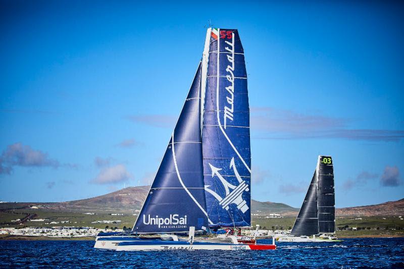 MOD70s at the start of the RORC Transatlantic Race. The Atlantic duel begins as Giovanni Soldini's Maserati and Lloyd Thornburg's Phaedo3 leave Lanzarote - photo © RORC / James Mitchell