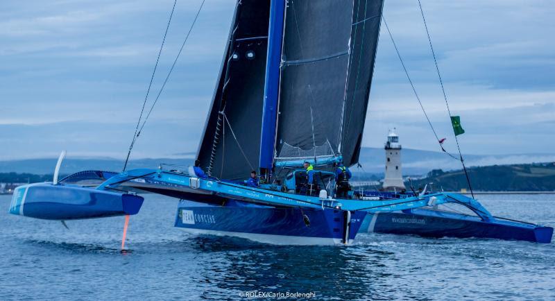 Approaching the finish line off the Plymouth breakwater Tony Lawson's MOD70 trimaran, Concise 10 in the Rolex Fastnet Race - photo © Rolex / Carlo Borlenghi