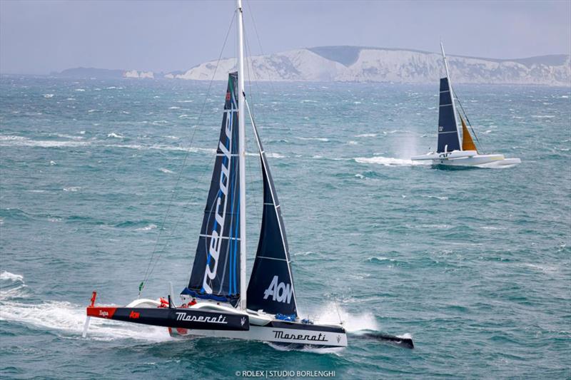 Giovanni Soldini's Multi70 Maserati and Jason Carroll's MOD 70 Argo exit the Solent in the Rolex Fastnet Race photo copyright Carlo Borlenghi / Rolex taken at Royal Ocean Racing Club and featuring the MOD70 class