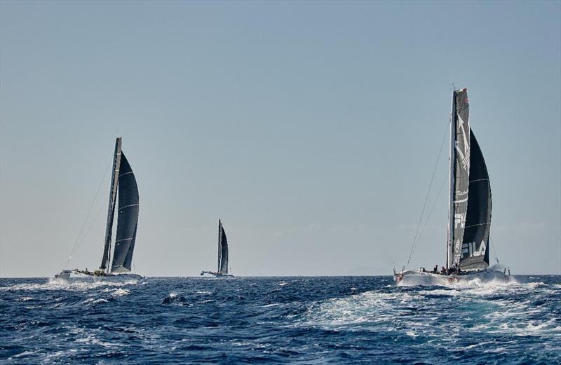 The powerful multihulls head off after the start of the RORC Transatlantic Race photo copyright James Mitchell taken at Royal Ocean Racing Club and featuring the MOD70 class