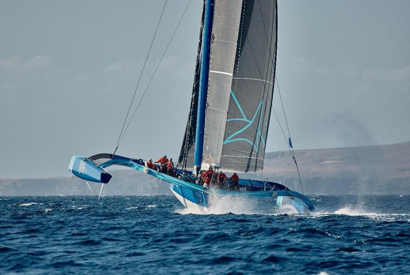 Peter Cunningham's MOD70 PowerPlay (CAY) hit speeds of 33 knots at the start of the RORC Transatlantic Race when 30 boats took the start off Marina Lanzarote for the 3,000 nm race to Grenada photo copyright James Mitchell taken at Royal Ocean Racing Club and featuring the MOD70 class
