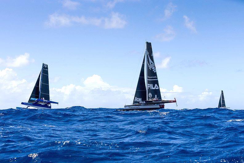 A battle is raging between the three foremost multihulls, with Giovanni Soldini's Maserati (ITA) and Jason Carroll's Argo (USA) less than a mile apart in the 13th RORC Caribbean 600 photo copyright Arthur Daniel / RORC taken at Antigua Yacht Club and featuring the MOD70 class