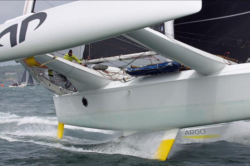 An Argo crewman is spotted through the trampoline as the MOD70 starts the Newport Bermuda Race photo copyright Sean McNeill taken at Royal Bermuda Yacht Club and featuring the MOD70 class