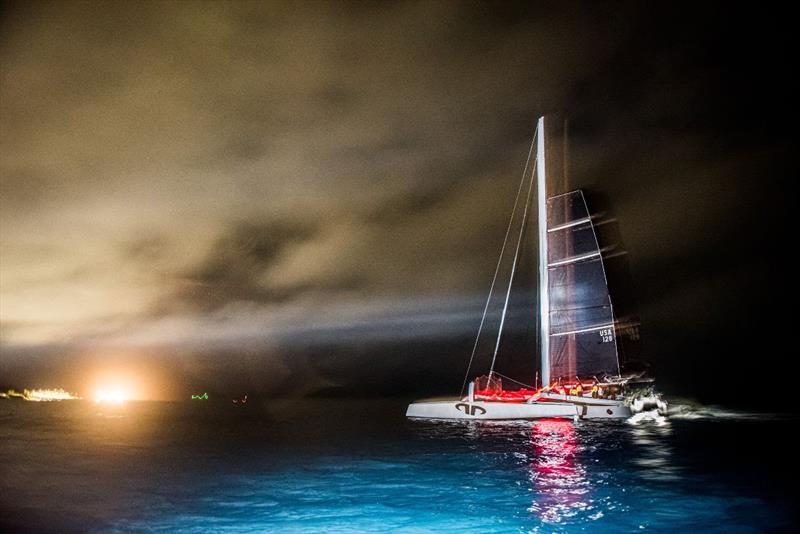 After finishing, Argo rolls up her jib with St. George's Harbour in the background and begins motor-sailing slowly around the island to Hamilton photo copyright Chris Burville taken at Royal Bermuda Yacht Club and featuring the MOD70 class