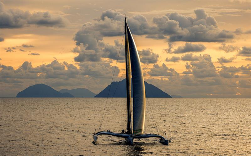 Riccardo Pavoncelli's MOD70 trimaran Mana passes the Aeolian Islands - Rolex Middle Sea Race - photo © Rolex / Carlo Borlenghi