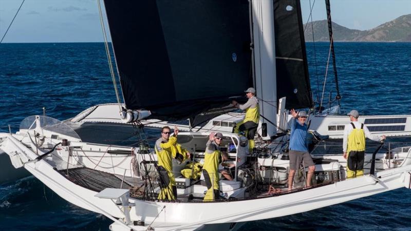The elated, record-setting team on MOD70 Argo after crossing the finish line in Antigua. Skipper Chad Corning, Pete Cumming, Sam Goodchild, Charles Ogletree, Alister Richardson, Brian Thompson - 2026 RORC Transatlantic Race - photo © @roddyacqua