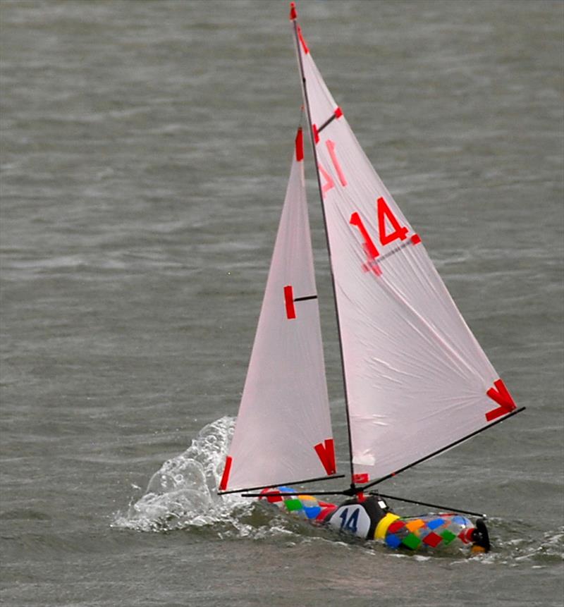 2019 Bottle Boat Championship at Waldringfield photo copyright Jonathan Fish 14 under pressure downwind during the Roger Stollery taken at Waldringfield Sailing Club and featuring the Model Yachting class